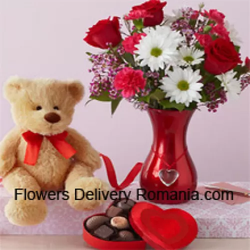 Rosas rojas y Gerberas blancas con algunos helechos en un jarrón de vidrio junto con un lindo oso de peluche marrón de 12 pulgadas de altura y una caja de chocolates importados