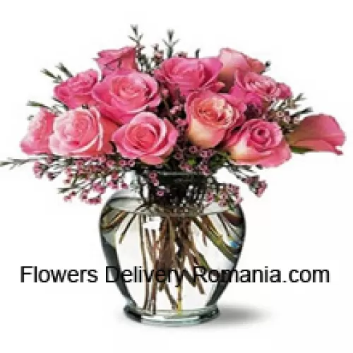 11 Pink Roses With Some Ferns In A Vase