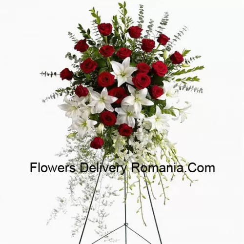 Un bellissimo bouquet di fiori per le condoglianze che viene fornito con un supporto